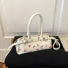 Bolsa de mão feminina texturizada de nicho estilo coreano 2026 nova bolsa bowling de alto valor para ombro e sob o braço