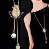 Estilo Coreano Acero de Titanio Desplegable Giratorio Copo de Nieve Cadena para Suéter Cadena Larga Versátil Otoño e Invierno para Mujer Colgante de Joyería de Alta Gama