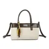 Bolso de hombro de moda versátil nuevo de principios de otoño Yaozi 2026, un bolso de mano elegante y práctico para ir al trabajo, con un diseño simple y casual, y también se puede llevar como bolso cruzado