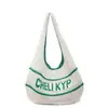 Bolso de Mano Tejido Simple Estilo Coreano Literario para Mujer 2025 Verano Nuevo Retro Hueco con Letra Bolso de Hombro para Axila