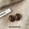 Pendientes de Botón Ovalados de Resina Transfronterizos Europeos y Americanos Pendientes Maillard de Otoño e Invierno Pendientes Simples de Moda Versátiles para Mujer Sensación de Alta Gama