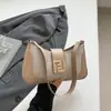 Bolso de Mujer 2025 Verano Nuevo de Gama Alta Versátil Moda Tendencia Nicho Bolso de Axila Bolso de Mano/Hombro de Moda