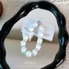 Popular llavero colgante de cuentas chapadas en colores de caramelo con lazo, llavero, accesorio para bolso, charm para funda de teléfono