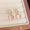 Estilo Francés Elegante Moderno Dulce Versátil Ojo de Gato Corazón Aretes de Botón Personalizados Lujo Ligero Fresco Simple Colgantes de Aretes Venta al por Mayor
