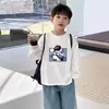 Camiseta de manga larga de algodón puro para niños, nuevo estilo primavera y otoño 2026, camisa holgada y elegante para niños pequeños, top de dibujos animados para niños mayores