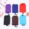 Fábrica en stock al por mayor color sólido plegable respetuoso con el medio ambiente bolsa de compras logotipo imprimible 190T poliéster almacenamiento bolso de mano bolsa
