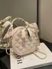Bolso Versátil de Moda de Alta Gama Transfronterizo para Mujer Modelo Nuevo 2025 Bolso Redondo Pequeño Sencillo de Nicho Popular Bolso de Hombro Exquisito