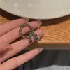 Anel de Contas da Sorte Novo de Luxo Leve Design de Nicho Feminino Anel Sino Elemental Estilo Doce e Cool Anel de Dedo Elástico Atacado