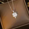 Exquisitos Pendientes de Trébol de Cuatro Hojas Completamente Diamantados Collar Moda Femenina Lujo Ligero Colgante Simple Versátil Joyería de Acero de Titanio de Gama Alta Venta al por Mayor