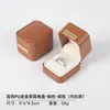 Caja para anillos dorada con esquinas redondeadas, una caja de joyería lujosa y de alta gama para collares y pulseras, perfecta para regalar; caja de embalaje para joyería de piel, disponible para venta al por mayor