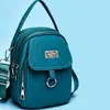 Mini mochila con múltiples compartimentos, bolsa impermeable casual para teléfono, tela Oxford, mochila pequeña de color block para mujer, multiusos, al por mayor