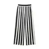 Moda Feminina 2026 Novo Estilo de Exportação Transfronteiriça: Top Halter Listrado Preto e Branco em Contraste de Cores e Calça de Cintura Alta com Listras Verticais e Pernas Largas