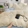 Juego de cuatro piezas estilo coreano minimalista con borde de concha en color liso, hecho de tela de algodón lavado, adecuado para la habitación doble de una niña, ropa de cama para todas las estaciones