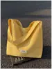 Bolsa de Lona Xadrez Vermelho Estilo Coreano Feminina 2026 Nova Bolsa Tote de Ombro Único Estilo College Bolsa de Ombro para o Trabalho