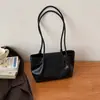 2026 Nova Moda Estilo Coreano Bolsa de Ombro Único Personalidade Feminina Primavera Deslocamento Elegante Bolsa Transversal Bolsa de Mão Simples de Nicho