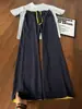 Pantalones casuales transpirables para hombre con patrón de escamas de dragón en colores contrastantes negro y rojo, pantalones deportivos finos de verano, pantalones rectos holgados estilo retro americano