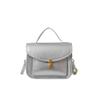 Bolso cuadrado pequeño y elegante, portátil, para primavera y verano de 2025, nuevo bolso de hombro de moda de nicho, bolso cruzado informal para mujer.