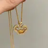 Collar con Candado Ruyi de Lingotes Pequeños de Estilo Nacional de Nicho para Mujer, Lujo Ligero Personalizado, Colgante Ruyi Incrustado con Diamantes Completos, Temperamento Versátil