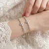 Pulseira de Trevo de Quatro Folhas com Fio Ajustável Totalmente Cravejada para Mulheres Exquisite Design de Nicho de Luxo Leve Joia de Mão Versátil Ajustável Atacado