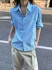 Camisa a rayas azul y blanco, fluida e intelectual, diseño holgado tipo chaqueta, top de alta gama, moderno