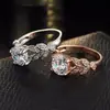 Anel de noivado popular de folha transfronteiriço anel de zircônia com quatro garras Anel de metal com diamante de flor moderno personalizado feminino
