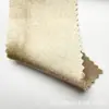Tejido de satén elástico, grueso y brillante con una caída suave, que presenta un efecto reluciente de seda artificial, adecuado para disfraces de baile y ropa formal.