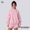 Conjunto de ropa europea y americana para mujer transfronterizo: sudadera casual y shorts, sudadera holgada de forro polar color liso, cuello medio alto, estilo 'dopamine hot girl'