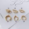 Accesorios de joyería DIY al por mayor chapado en cobre color oro real 18K retenedor de color hueco tridimensional clip para la oreja aretes porosos