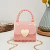 2023 Nuevo bolso mini de gelatina portátil con cierre de corazón en relieve de diamante bolso pequeño casual boca sobre rojo