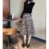 22733 Da Ai Mei Yi Yuan 2025 Otoño Nueva Moda Top Negro de Moda con Falda Estampada para Mujeres Elegantes