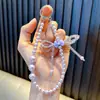 Cadena de teléfono móvil perlada llavero cadena colgante cordón de teléfono móvil de perla pulsera de muñeca con lazo pequeño regalo regalo al por mayor