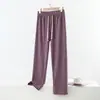 Nuevos pantalones de cuadros para otoño e invierno para mujer, con cintura elástica estilo americano, forro de felpa doblemente cepillado y diseño de pierna ancha, perfectos para uso casual.