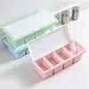 Caja de condimentos de 4 estilos botella de condimentos de sal y glutamato monosódico de plástico multifuncional cocina caja de condimentos separada con cuchara y tapa venta al por mayor