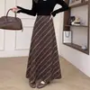 Falda de mujer con estampado de lunares y rayas estilo retro, nueva falda larga adelgazante de cintura alta en negro para otoño