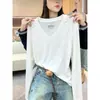 Camiseta de manga larga con cuello en V de algodón de bambú para mujer, tendencia INS, estilo fino de principios de otoño, para usar en capas o sola, top versátil de color liso, capa base