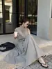 Vestido Largo de Cuello Acampanado Estilo Old Money Wanwei para Mujer Primavera 2026 Nuevo Manga Corta Volante Empalme Cintura Ceñida Vestido de Trabajo P5467