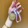 Regalos del Festival del Medio Otoño para Clientes: Pasteles de Luna, Bolsas de la Suerte, Dijes Dorados para Teléfono, Llaveros, Cadenas para Teléfono, Dijes para Bolsos