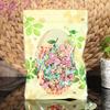 Bolsa sellada con flores de tres colores de fondo plano, bolsa de hueso de tracción de fondo plano transparente con impresión de tres colores, bolsa autosellada, bolsa de embalaje de grado alimenticio