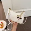 Bolsa de axila para mulheres com pele oleosa, novo estilo transfronteiriço, de alta qualidade, simples, bolsa de ombro versátil, bolsa tote e crossbody casual da moda