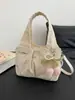 Bolsa de Mão/Ombro Feminina Grande Capacidade Estilo Casual Tendência Nova Moda Verão 2026 Valor Alto Nicho