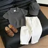 Roupa Infantil Estilo Coreano 2026 Verão Novo Elegante Gola Polo Bordada Amarelo Tricô Manga Curta Casual Calça Reta