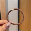 Banda de goma para el cabello para mujer, tocado de cuerda, aro elástico para el cabello, sencillo, famoso en Internet, accesorios para el cabello sencillos, funda de cuero, cuerda fina para el cabello para mujer