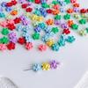 Cadena para teléfono móvil hecha a mano, pulsera, horquilla, accesorios de joyería, venta al por mayor, material de aleación con agujero recto y flor de color caramelo