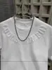 Camiseta de Manga Curta Estampada em Aço Novo Estilo Letra Popular Cor Sólida Camisa Básica Masculina Gola Redonda Estilo Coreano Peça Versátil