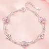 Pulsera de Doble Capa con Trébol de Cuatro Hojas Estilo Lujo Ligero Europeo 2026 para Mujer Moda de Nicho Temperamento Versátil Joyería de Mano Regalo