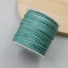 Una voluta de pulsera de pelo trenzado de mousse Un hilo de jade Pulsera tejida a mano DIY Colgante de collar Cordón para colgar Cuerda de mano Cuerda roja