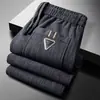Pantalones casuales con forro polar, engrosados para otoño e invierno, pantalones largos para hombre, pierna recta, modernos, versátiles, ropa para hombre de talla grande, pantalones de chándal de pana