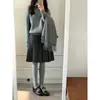 Item quente do Xiaohongshu~ Saia midi plissada estilo preppy outono/inverno em mistura de lã cinza escuro para mulheres, cintura alta, saia evasê que afina