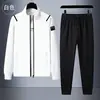 Nuevo Traje Deportivo Casual de Dos Piezas para Pareja Primavera y Otoño en Stock Conjunto de Sudadera y Pantalón de Chándal de Color Sólido y Estampado de Venta Caliente Europea y Americana