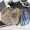 Conjunto de Verano para Niños 2026 Ropa Casual de Verano para Niños Nueva Ropa de Bebé Rayada de Manga Corta Pantalones Cortos Conjunto de Dos Piezas Moderno Dropshipping